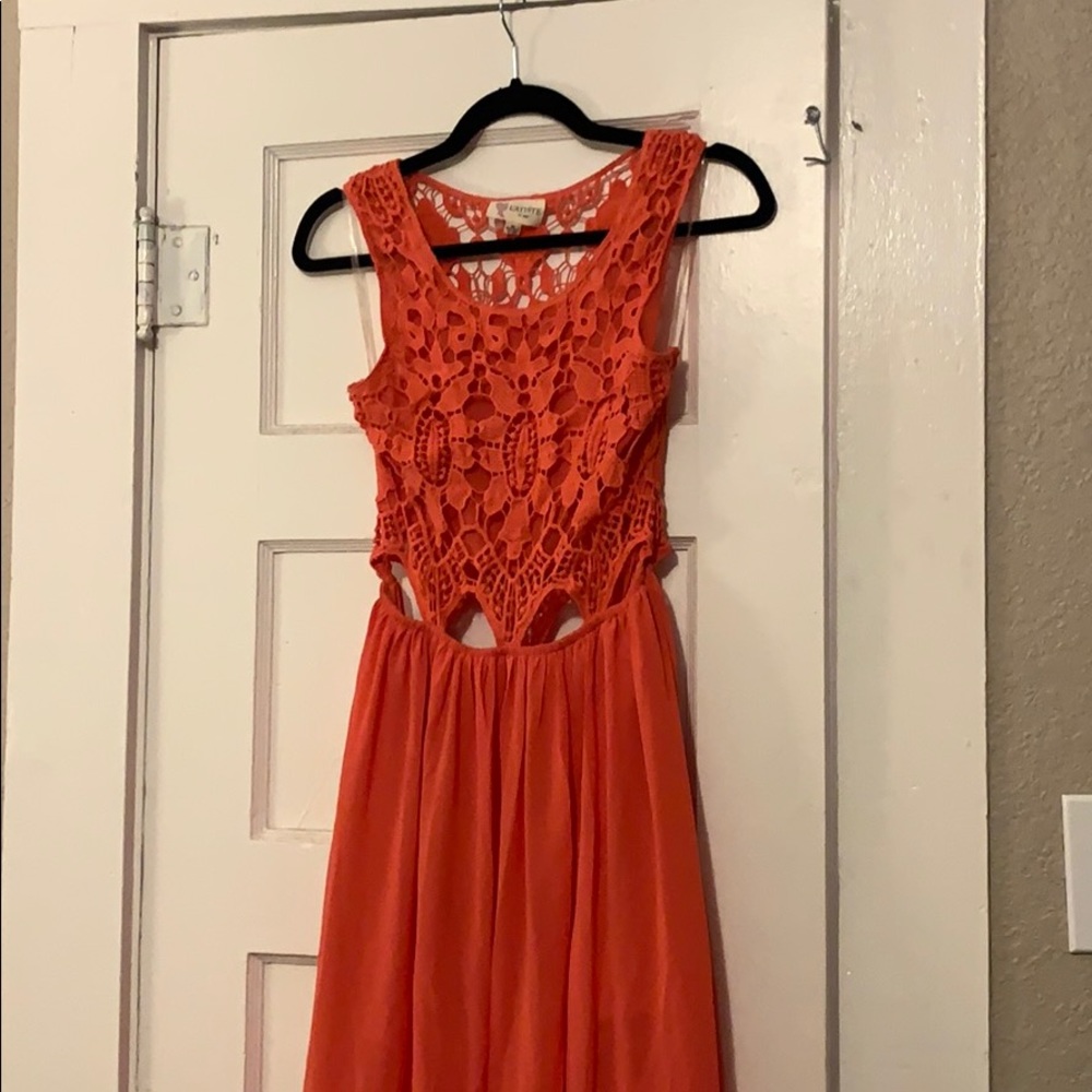 Sleeveless cut out sheer dress